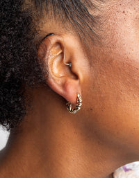 Gold Twisted Oval Huggie Hoop Earrings - link has visual effect only