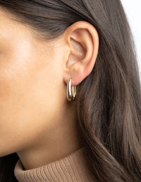 Gold Oval Huggie Hoop Earrings - link has visual effect only