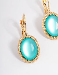 Gold Oval Huggie Earrings - link has visual effect only