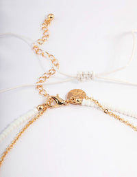 Gold Three Row Bead Shell Necklace - link has visual effect only