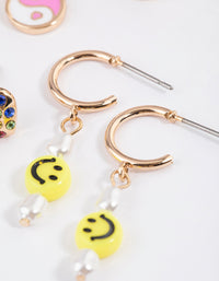 Gold Smiley Heart Earrings 4-Pack - link has visual effect only