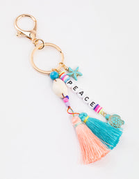 Gold Peace Tassel Key Ring - link has visual effect only