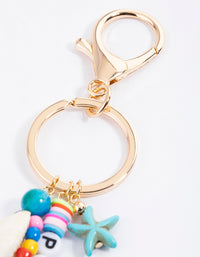 Gold Peace Tassel Key Ring - link has visual effect only