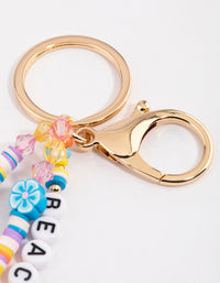 Gold Beach Babe Key Ring - link has visual effect only