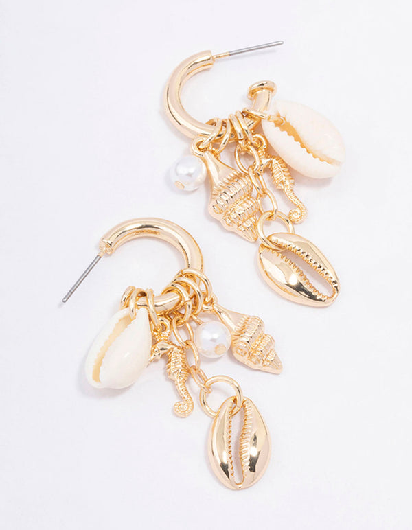 Gold shell hoop deals earrings