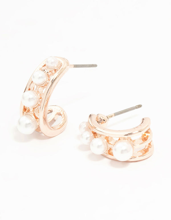 Rose Gold Pearl In Lay Huggie Earrings