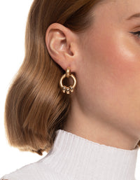 Worn Gold Small Door Knocker Earrings - link has visual effect only